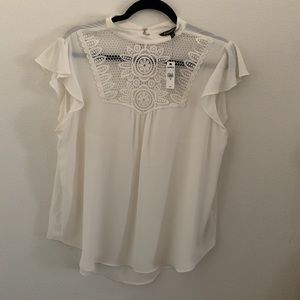 Ivory/cream colored blouse